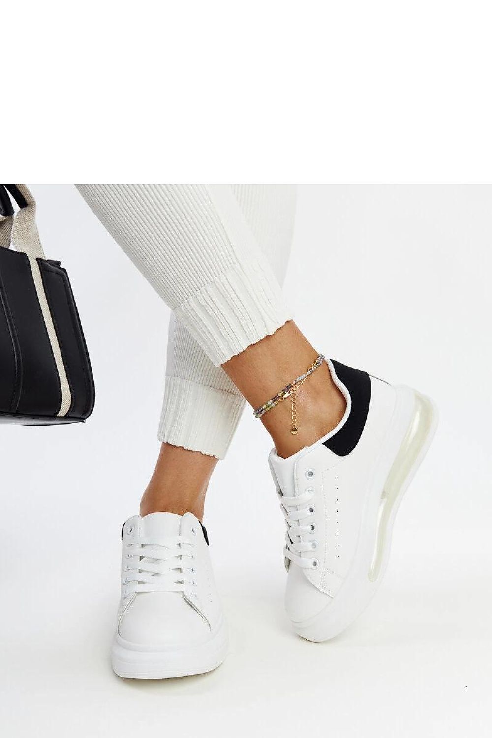   Białe sneakersy na wysokiej podeszwie Zrina - Solea 