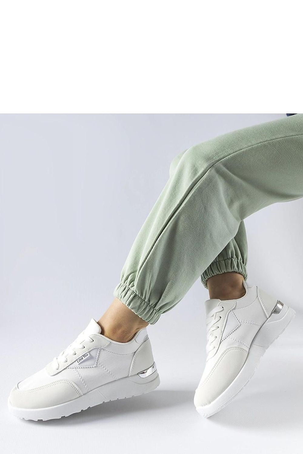   Białe materiałowe sneakersy Geraldino - Solea 