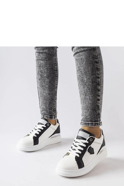   Biało-czarne sneakersy ze srebrnym akcentem Via - Solea 