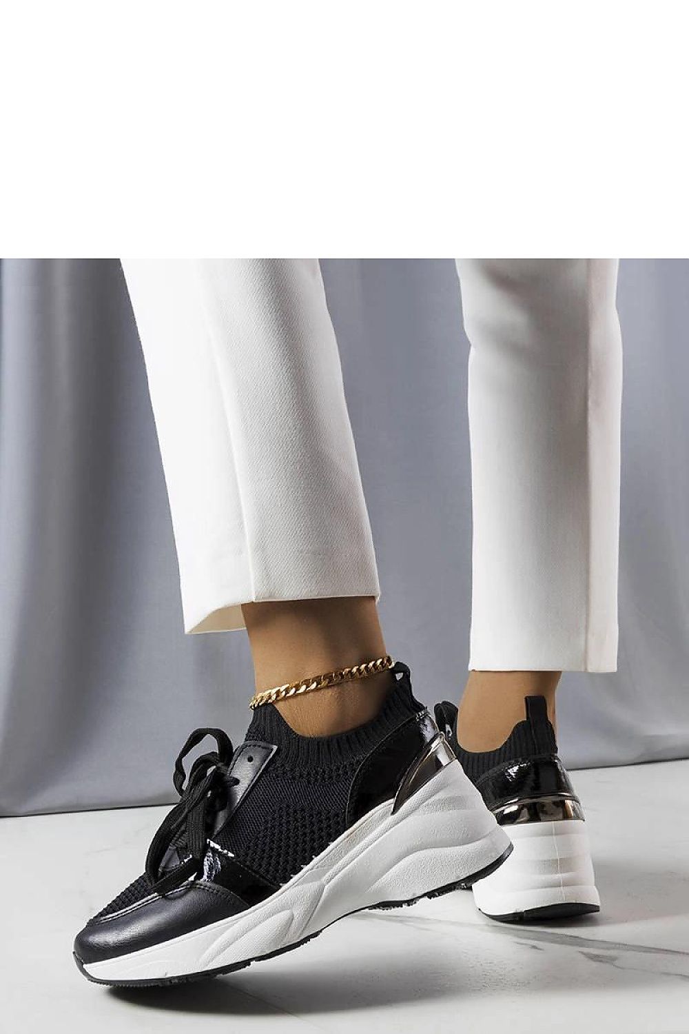   Czarne sneakersy na koturnie Ann - Solea 